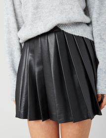 Jupe plissée en tissu enduit
