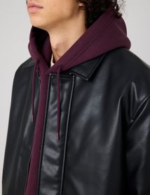 Blouson zippé en tissu enduit