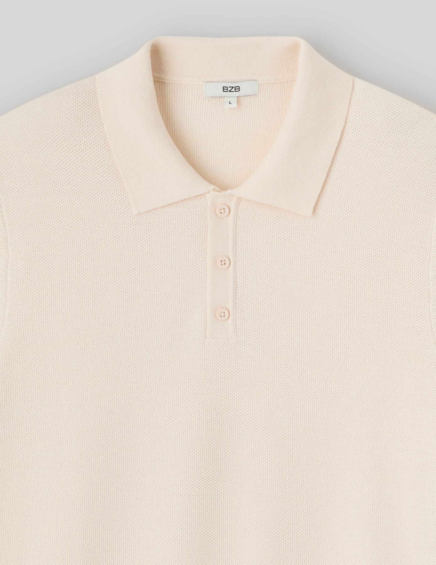 Polo matière fantaisie