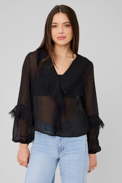 Blouse &agrave; volants et dentelle