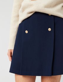 Jupe courte avec boutons dorés