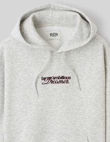 Sweat capuche broderie devant/dos