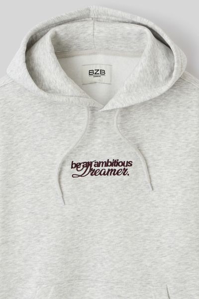 Sweat capuche broderie devant/dos