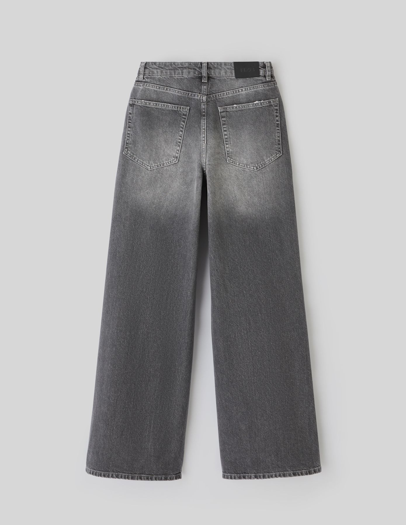 Jean wide leg ceinture asymétrique