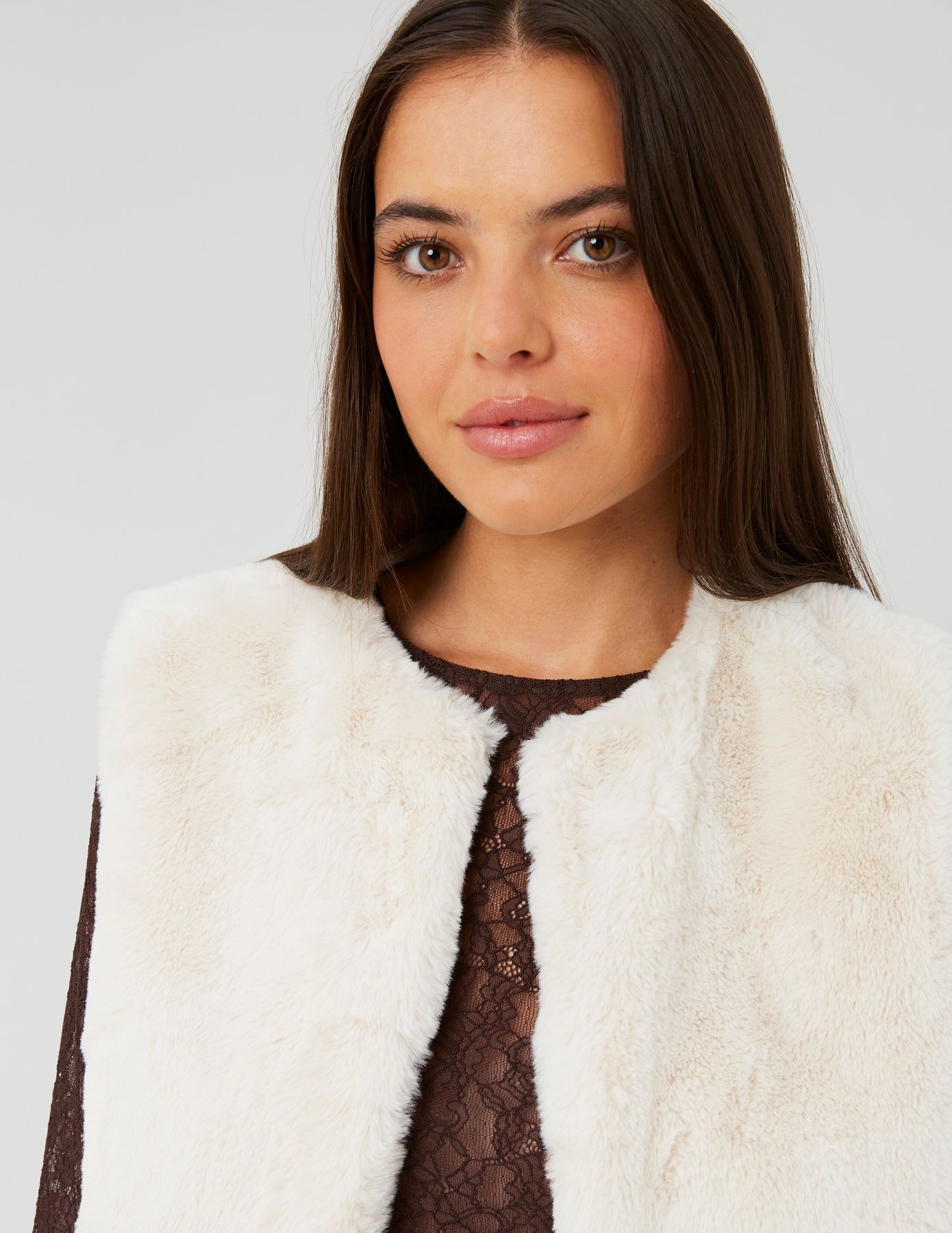 Veste matière duveteuse sans manches