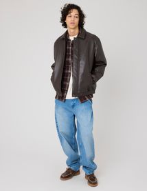 Blouson zippé en tissu enduit