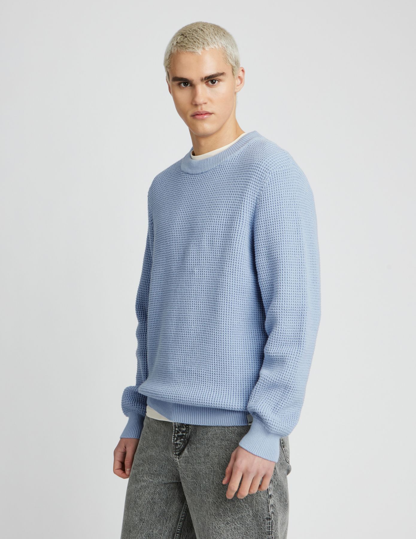 Pull col rond matière fantaisie