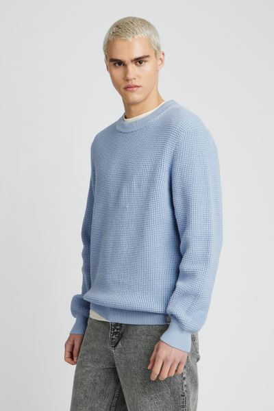 Pull col rond matière fantaisie