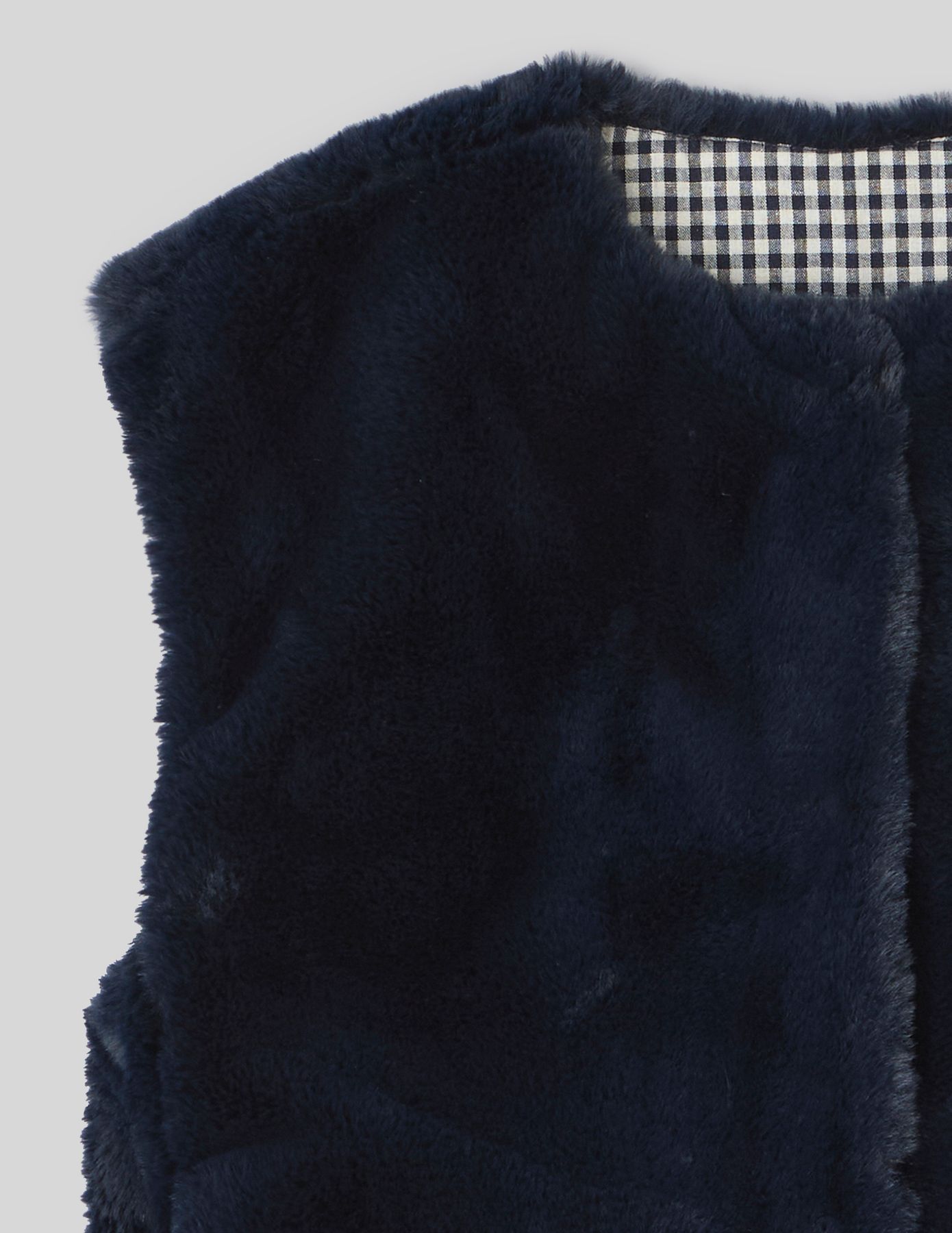 Veste matière duveteuse sans manches