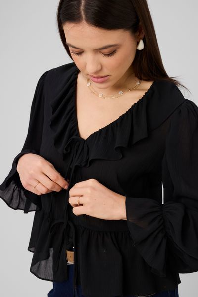 Blouse &agrave; volants