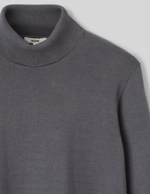 Pull col roulé