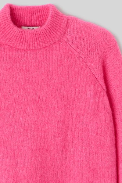 Pull premium col montant
