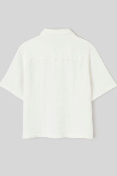 Polo en mati&egrave;re textur&eacute;e