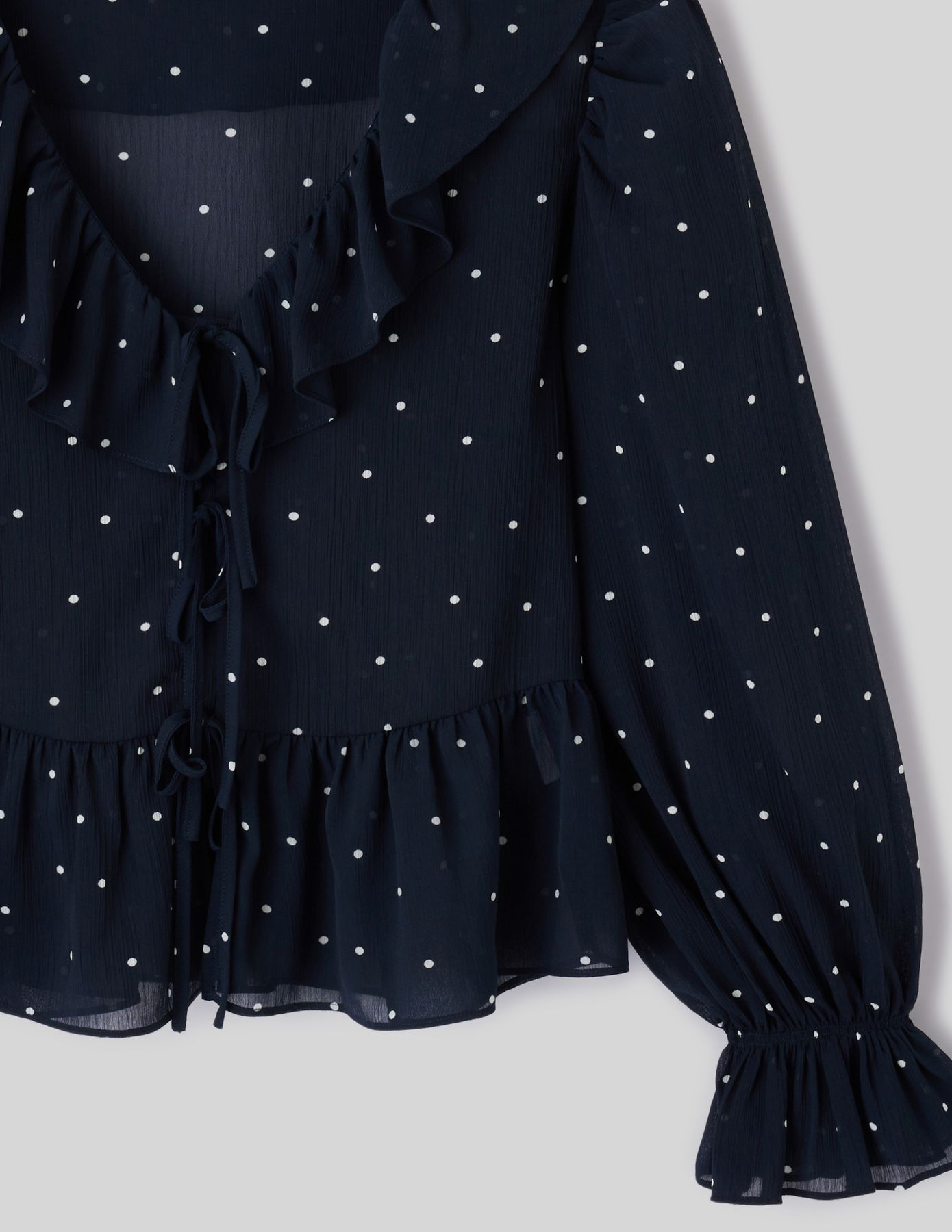 Blouse &agrave; volants motif pois