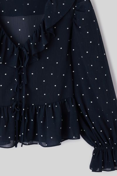 Blouse &agrave; volants motif pois