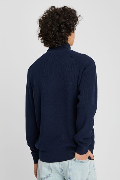 Pull col roulé
