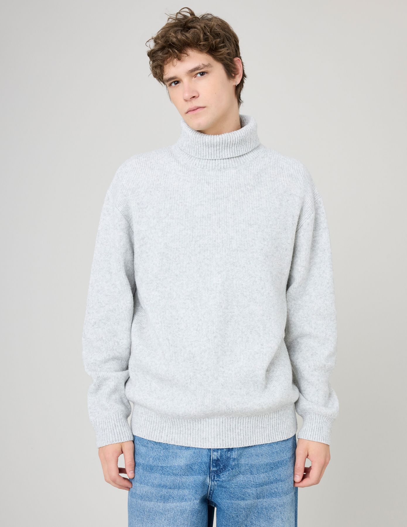 Pull col roulé
