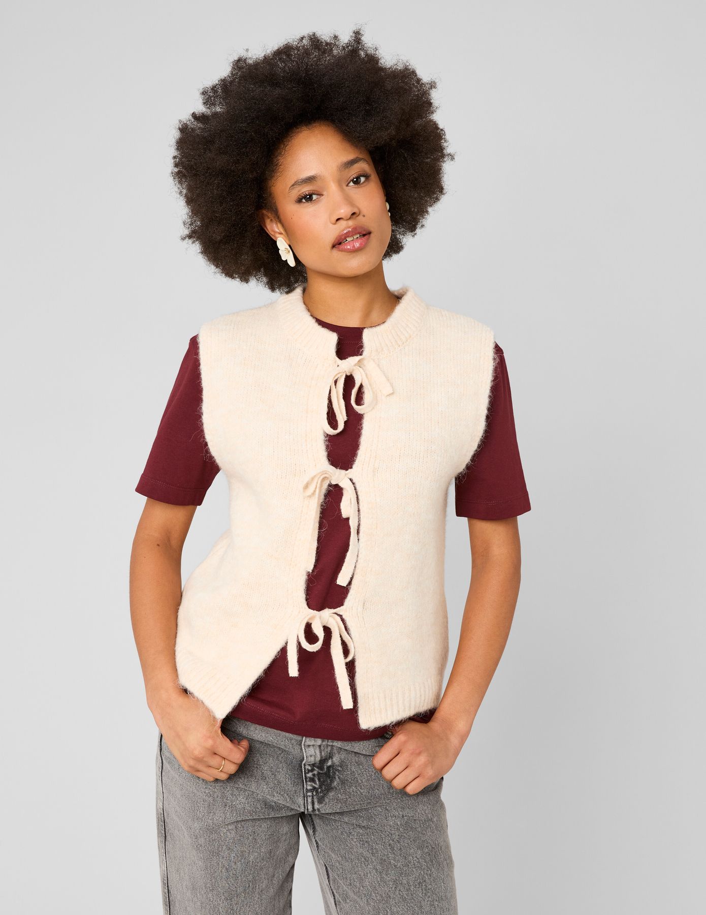 Gilet sans manches &agrave; noeuds