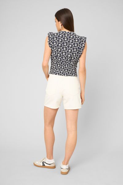 Top &agrave; volants en broderie anglaise