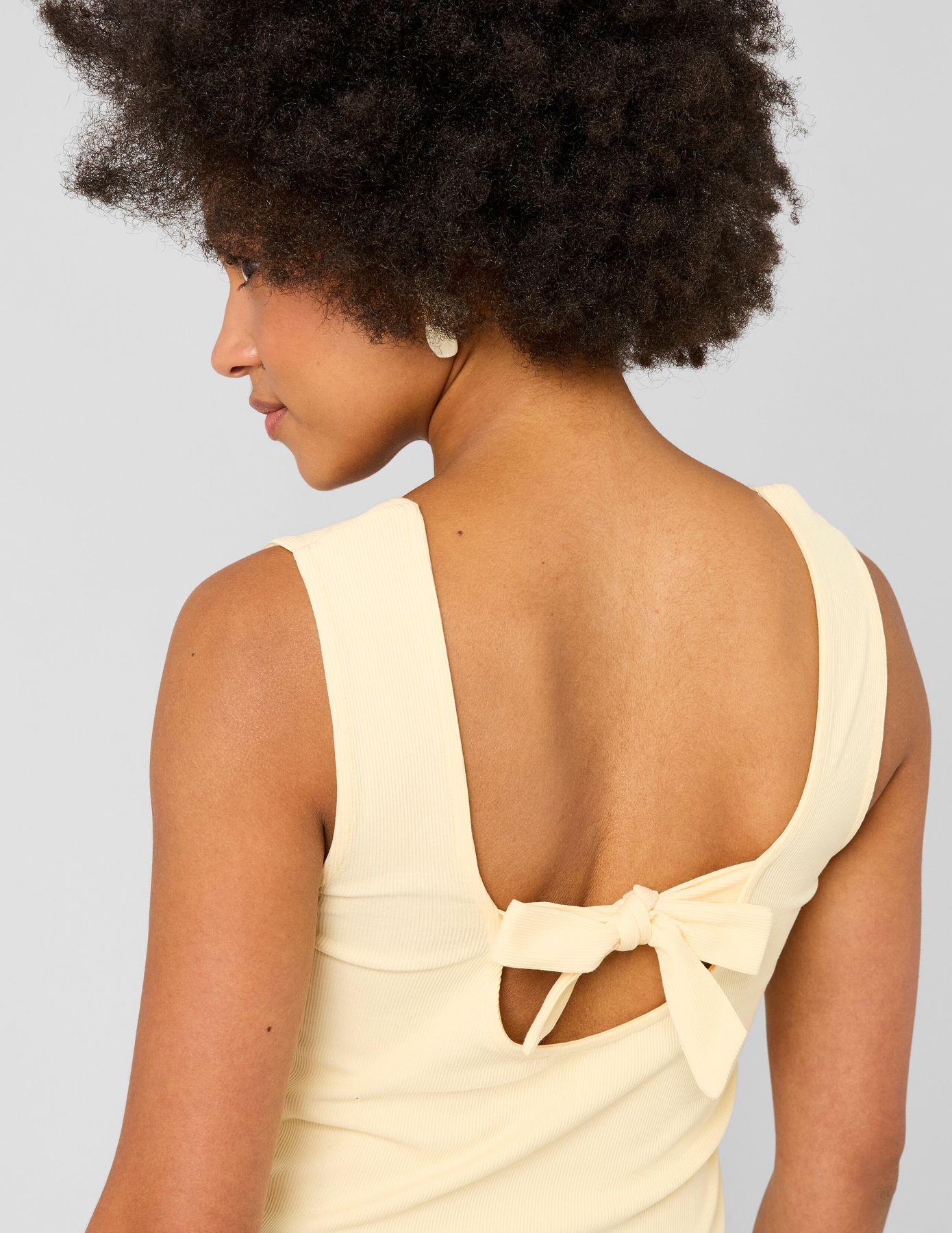 D&eacute;bardeur avec d&eacute;tail de n&oelig;ud au dos