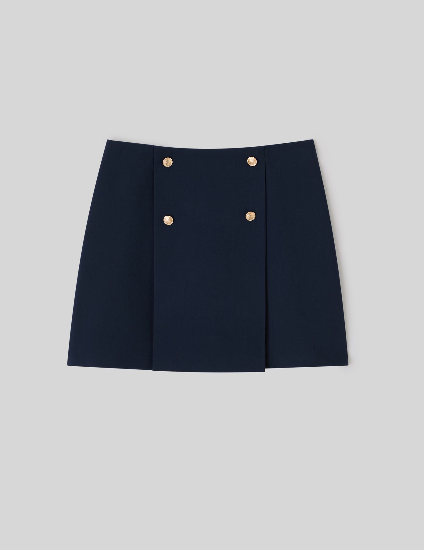 Jupe courte avec boutons dorés