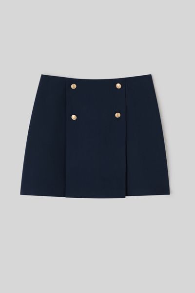 Jupe courte avec boutons dorés