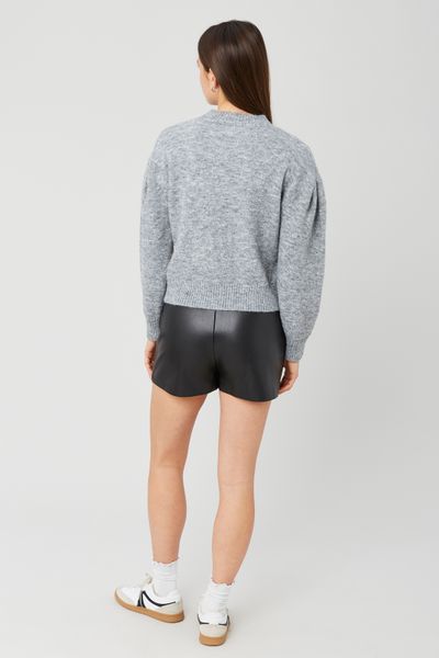 Jupe short en tissu enduit