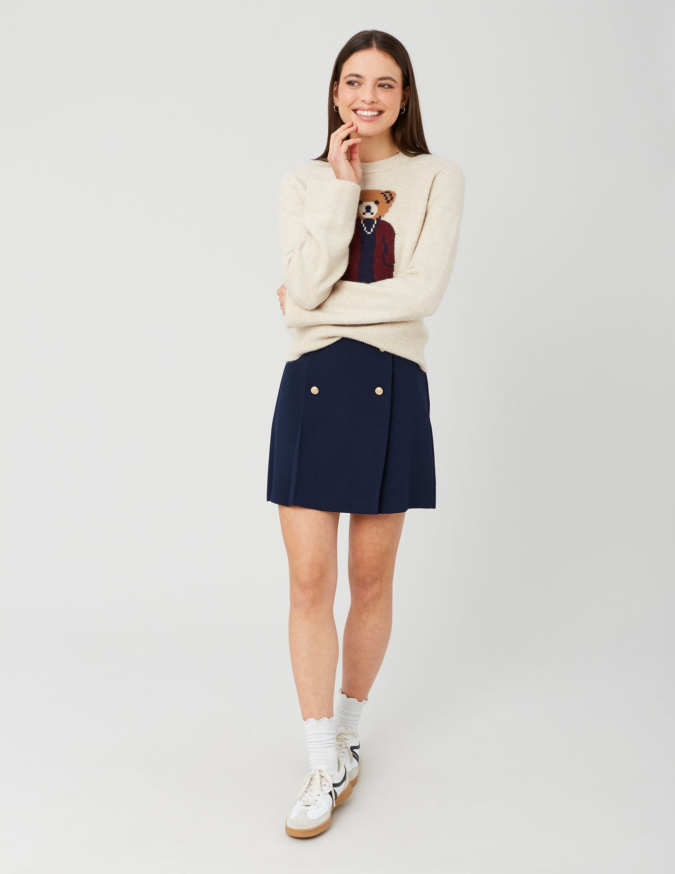 Jupe courte avec boutons dorés