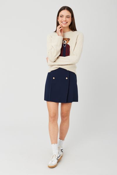 Jupe courte avec boutons dorés