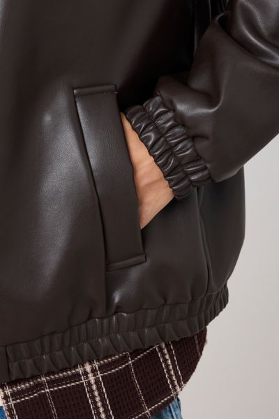 Blouson zippé en tissu enduit