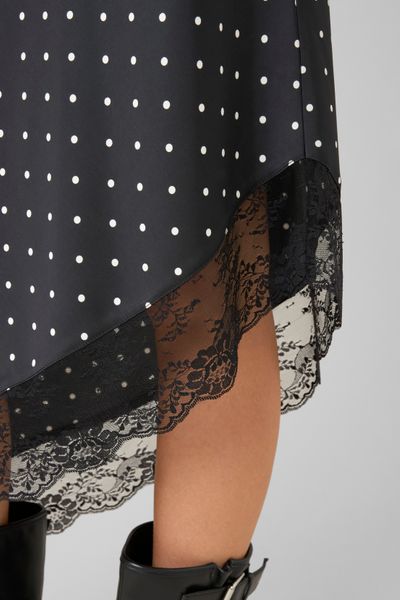 Jupe midi asym&eacute;trique &agrave; pois
