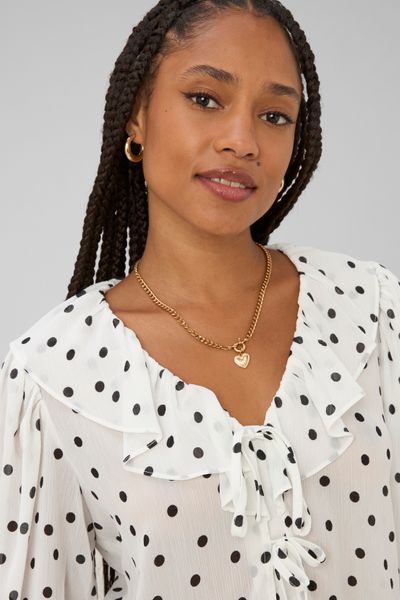 Blouse &agrave; volants motif pois