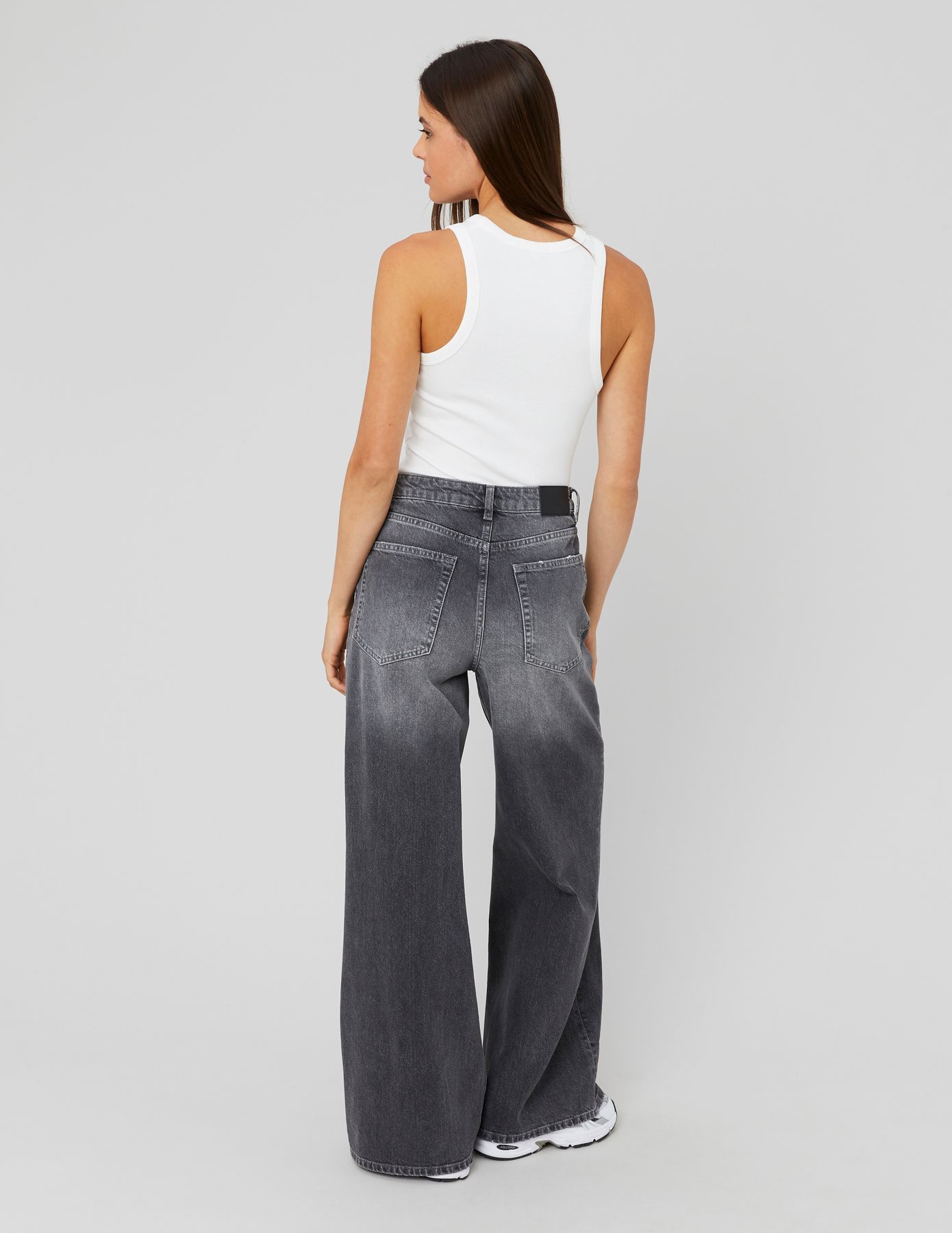 Jean wide leg ceinture asym&eacute;trique
