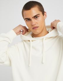 Sweat à capuche matière fantaisie
