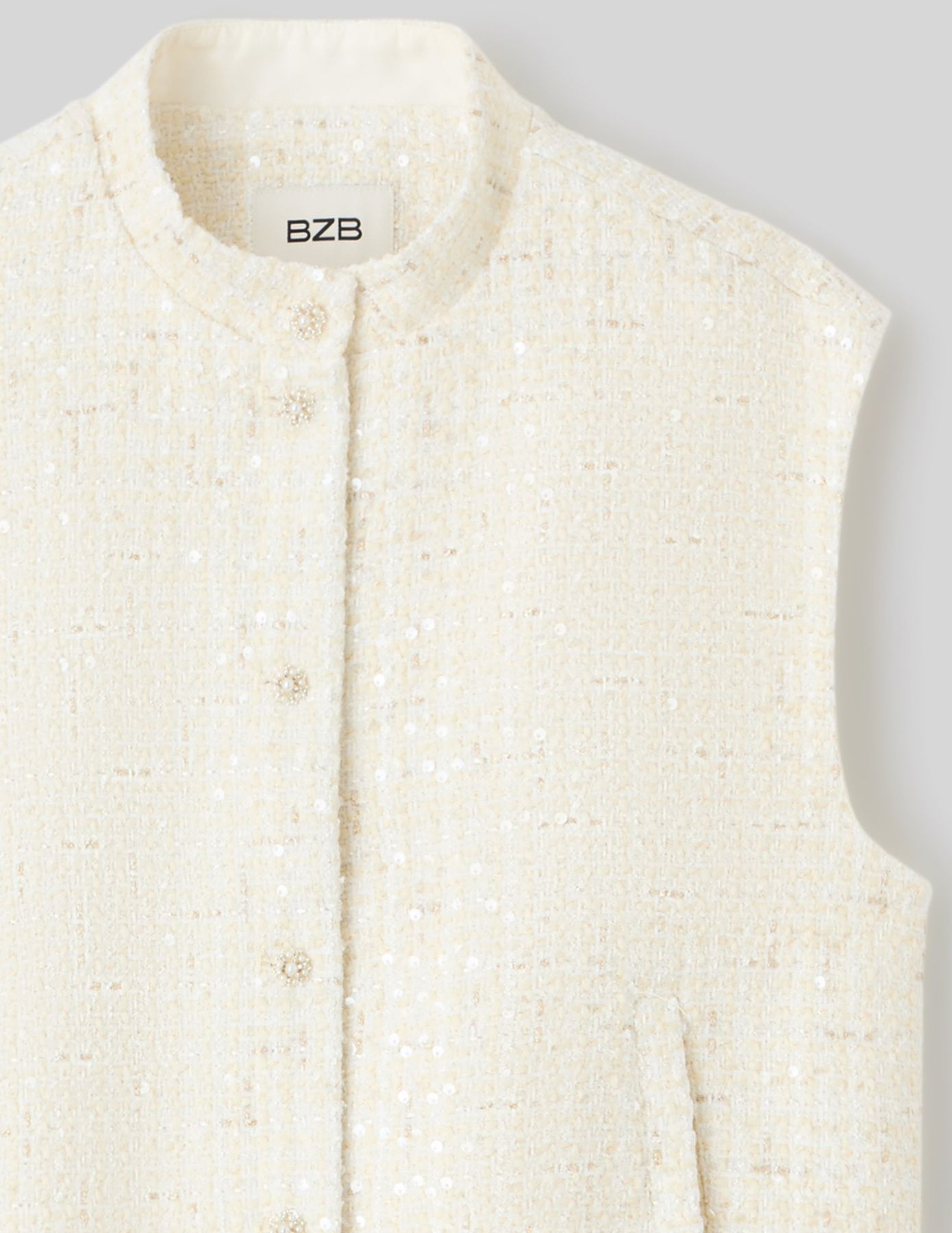 Veste tweed sans manches effet brillant