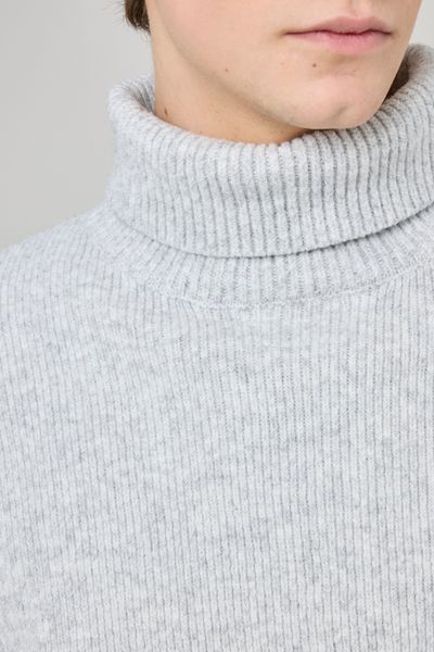 Pull col roulé