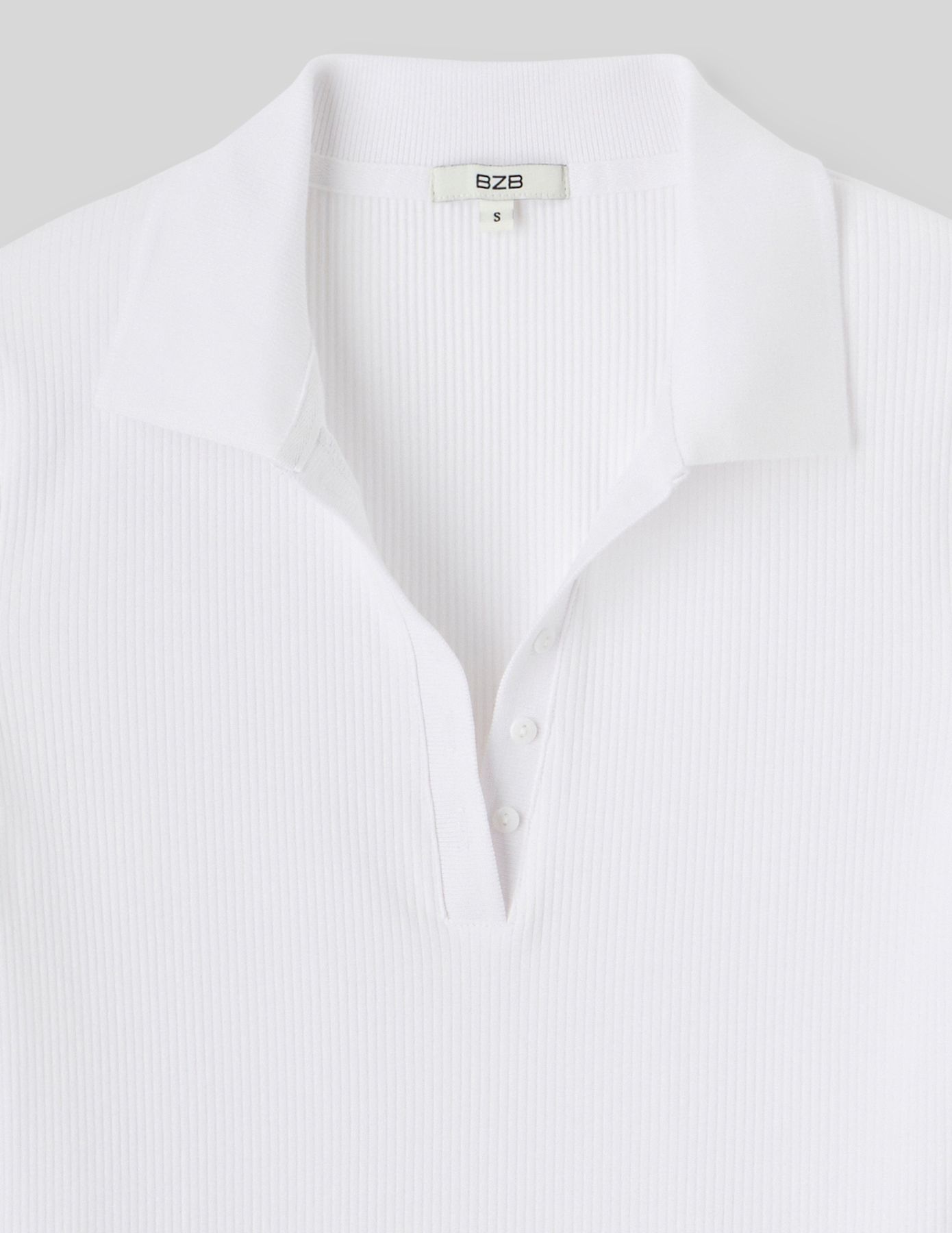 Polo col V boutonné