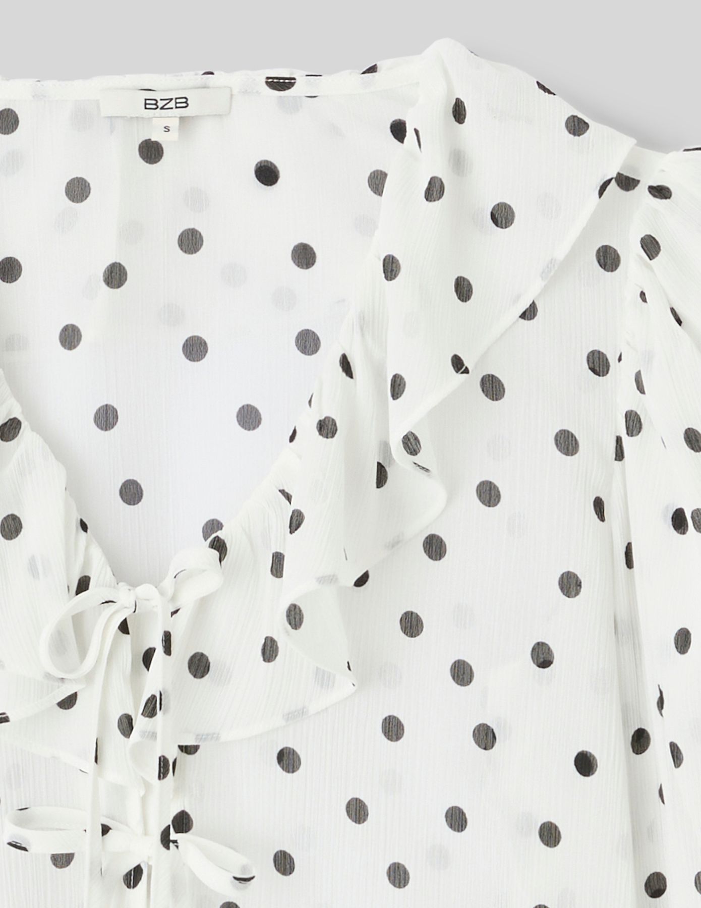 Blouse &agrave; volants motif pois
