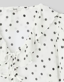 Blouse &agrave; volants motif pois