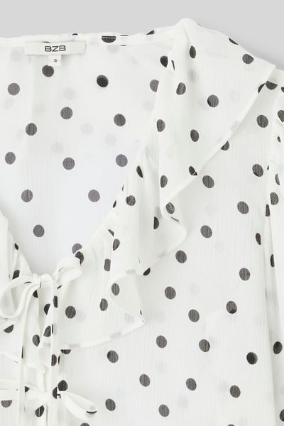 Blouse &agrave; volants motif pois