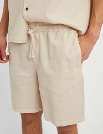 Bermuda unie en mati&egrave;re gaufr&eacute;