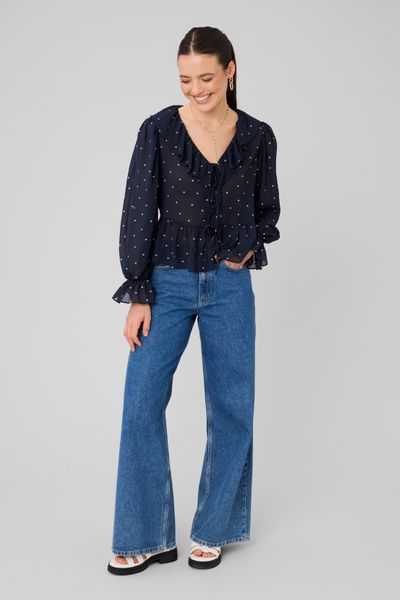 Blouse &agrave; volants motif pois