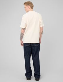 Polo mati&egrave;re gaufr&eacute;e