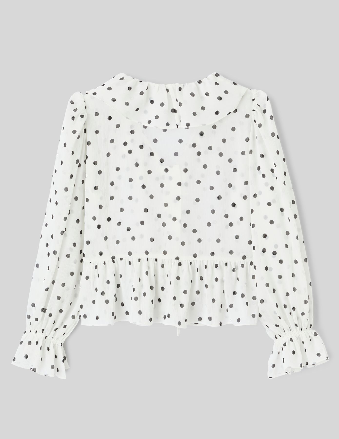 Blouse &agrave; volants motif pois