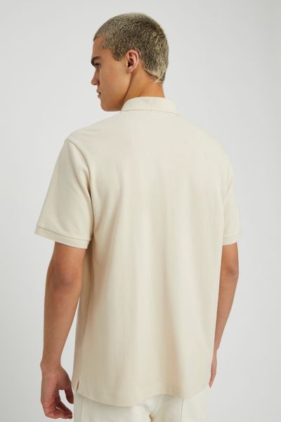 Polo matière fantaisie