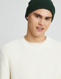 Pull col rond matière fantaisie