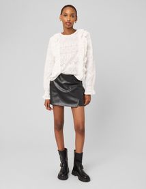 Jupe short en tissu enduit