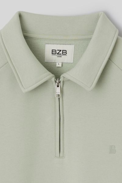 Sweat col polo zipp&eacute;